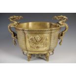 A Chinese gilt bronze quatrefoil shaped dragon jardiniere, decorated with two rectangular dragon