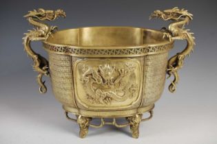 A Chinese gilt bronze quatrefoil shaped dragon jardiniere, decorated with two rectangular dragon