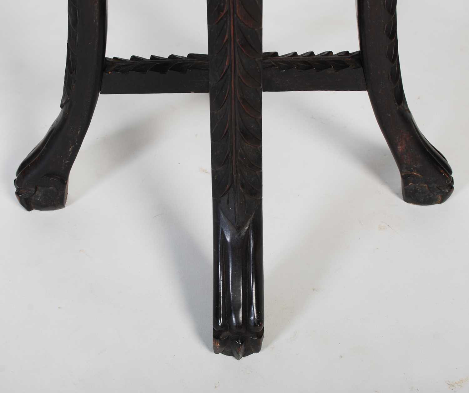 A Chinese dark wood urn stand, late 19th/ early 20th century, the octagonal-shaped top centred - Image 4 of 7