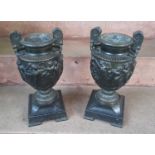 A pair of French bronze classical urns, after the Antique, based on the Townley vase, cast in relief