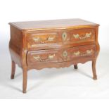 A mid-18th century French Provincial cherrywood bombe commode, the rectangular top with serpentine