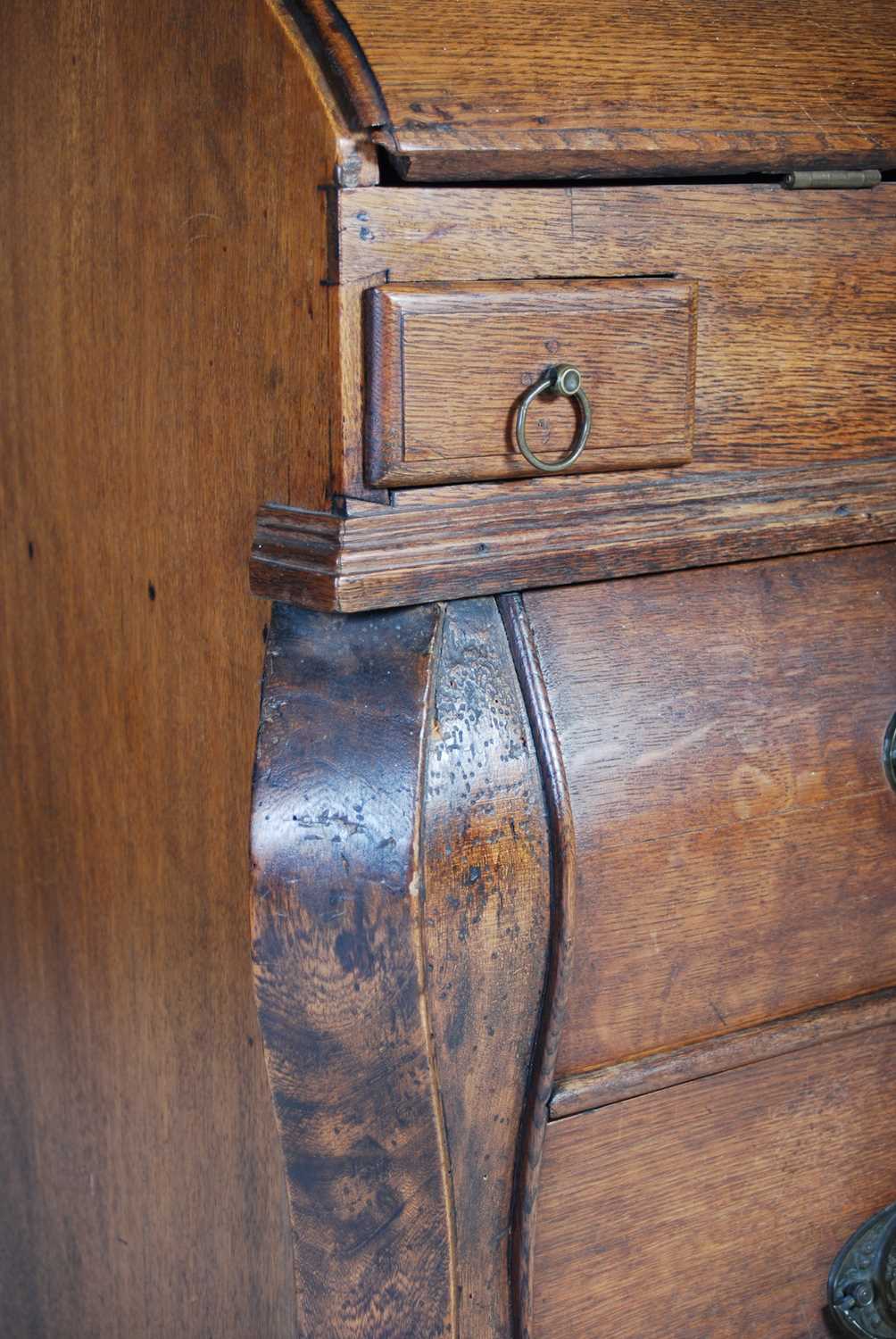 A late 18th century Dutch oak bombe bureau, the serpentine fall-front opening to a fitted interior - Image 3 of 11