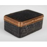 A tortoiseshell oblong snuff box with overall wave pattern design, with gilt-copper hinge, borders