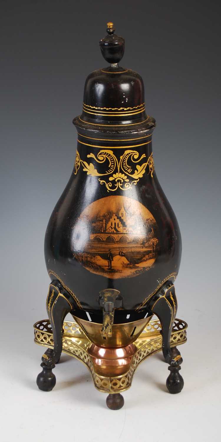 An 18th century Dutch lacquered pewter coffee pot and stand, the coffee pot with detachable cover