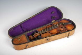 A 19th century miniature violin, in fitted mahogany case, the violin 33cm long.