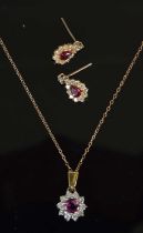 A white and yellow metal, ruby and diamond cluster pendant and chain together with a pair of 18ct