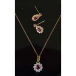 A white and yellow metal, ruby and diamond cluster pendant and chain together with a pair of 18ct