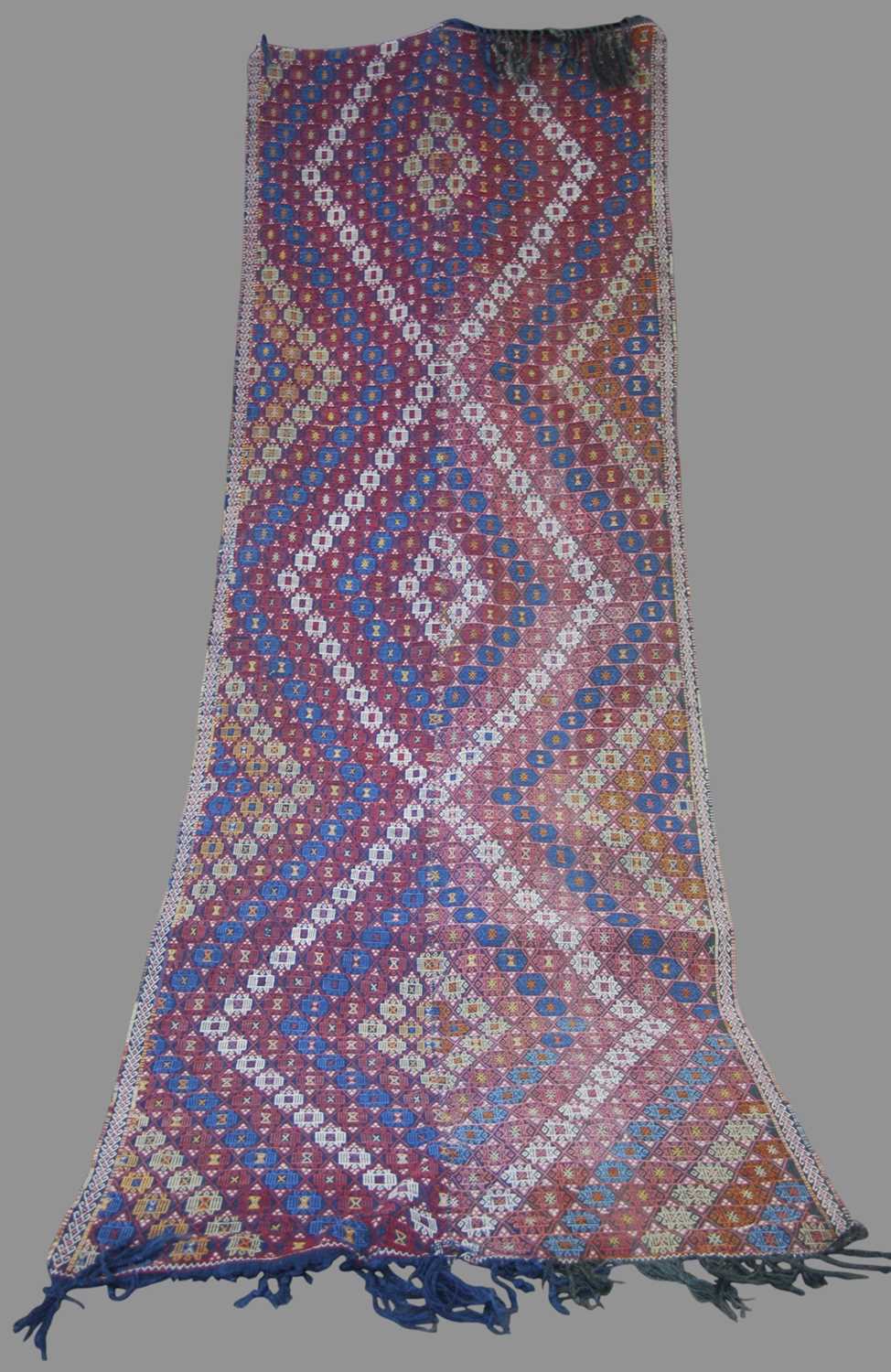 An Eastern Turkish Maras Gigim flat-weave long rug, early 20th century, worked all-over with a