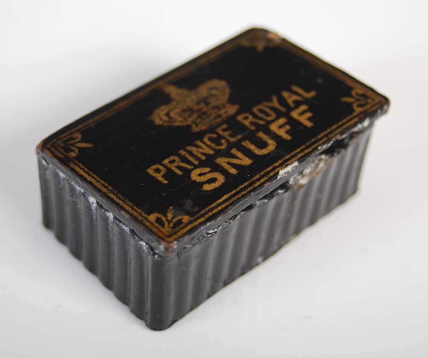 A black lacquer papier-mâché oblong Advertising snuff box with reeded sides and radiating base,