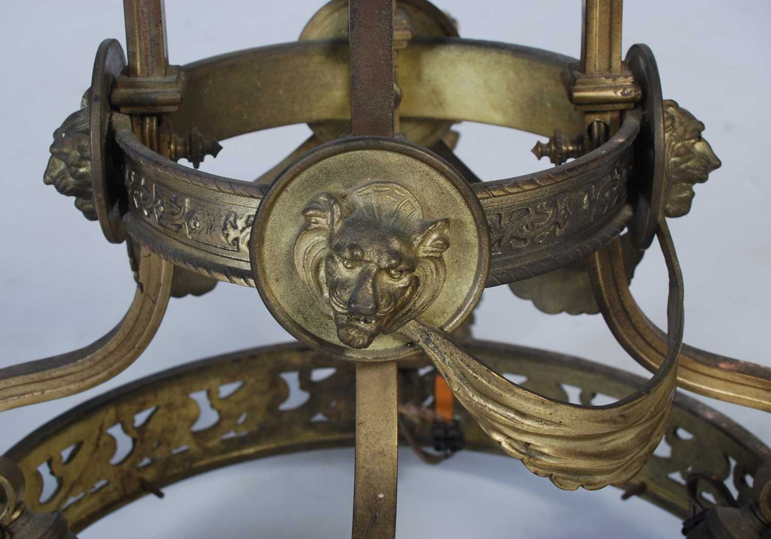 A late 19th/ early 20th century brass four-light hanging chandelier, set with four foliate cast - Image 3 of 6