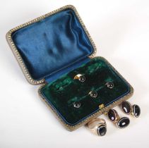 A cased set of yellow metal mounted banded agate shirt studs and pair of cufflinks, together with