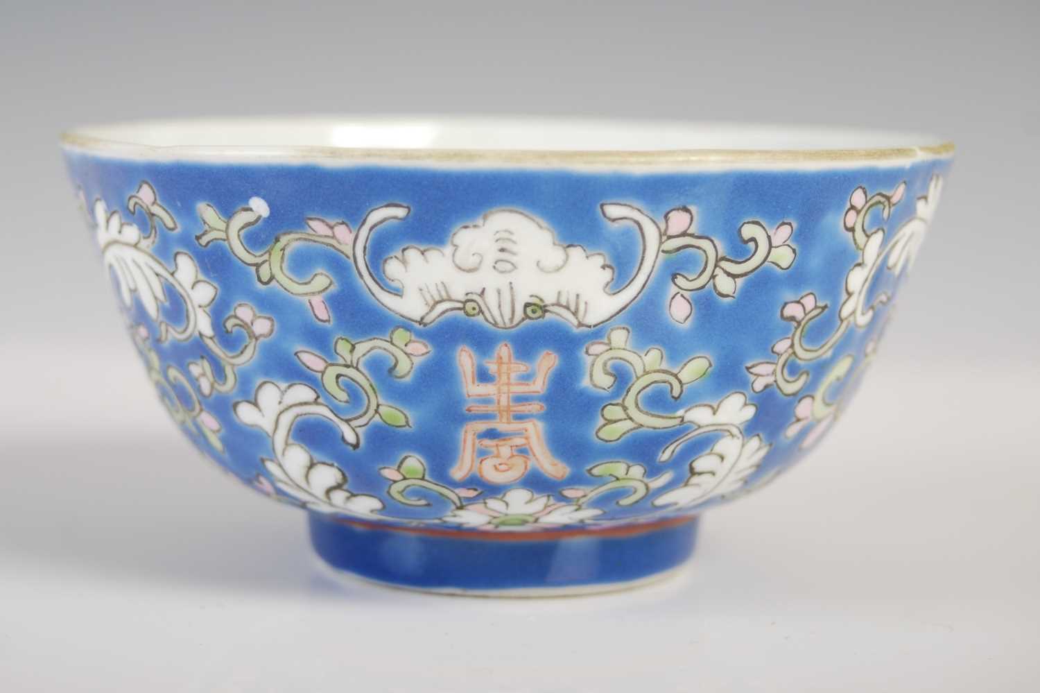 A Chinese porcelain blue ground footed bowl, late 19th/ early 20th century, decorated with lotus - Image 2 of 6