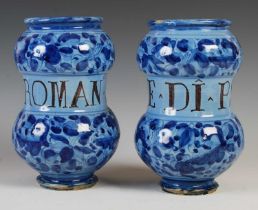 A pair of Italian pottery drug jars of Alberello form, one inscribed 'E-Di-Psilio', the other