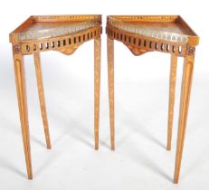 A pair of 18th century Dutch mahogany and marquetry inlaid corner tables, the tops inlaid with