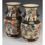 A pair of Chinese porcelain famille rose crackle glazed Warrior vases, late Qing Dynasty,