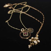 A late 19th century yellow metal necklace with split pearl decorated pendant, 4.4 grams, together