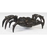 A late 19th/ early 20th century bronze model of crab, 15.5cm wide x 4.5cm high.