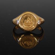 An 18ct gold and diamond signet ring, the matrix with intaglio decoration of a sailing ship within a