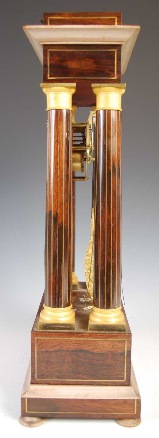 A French Charles X rosewood and brass inlaid Portico clock, the engine turned silvered dial with - Image 4 of 8