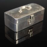 A 19th century Dutch silver rectangular box, formed as a miniature casket, with engraved foliate