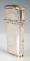 A George III white metal etui, of tapered rectangular form, with push button cover opening to a