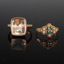 Two late 19th/ early 20th century yellow metal dress rings, comprising a single stone rock crystal