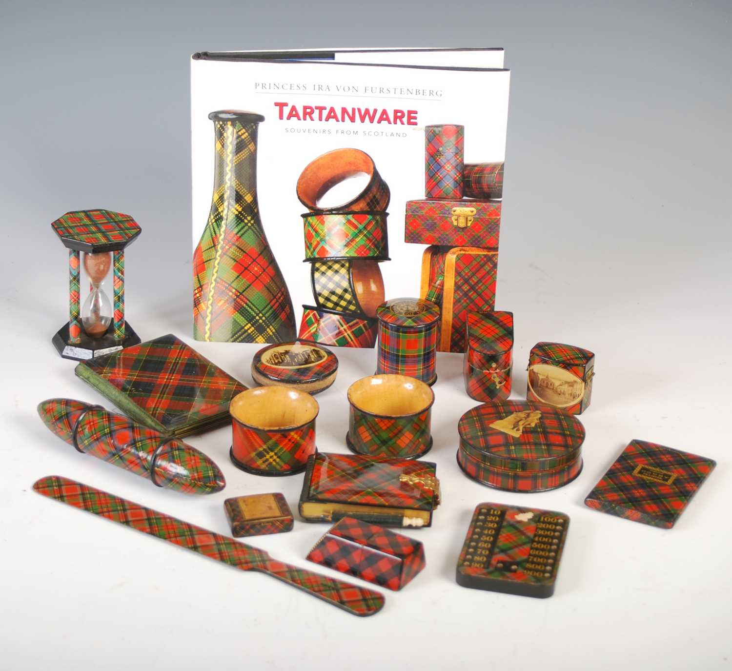 A collection of Tartan Ware, to include Prince Charlie page turner; MacDuff thimble holder and