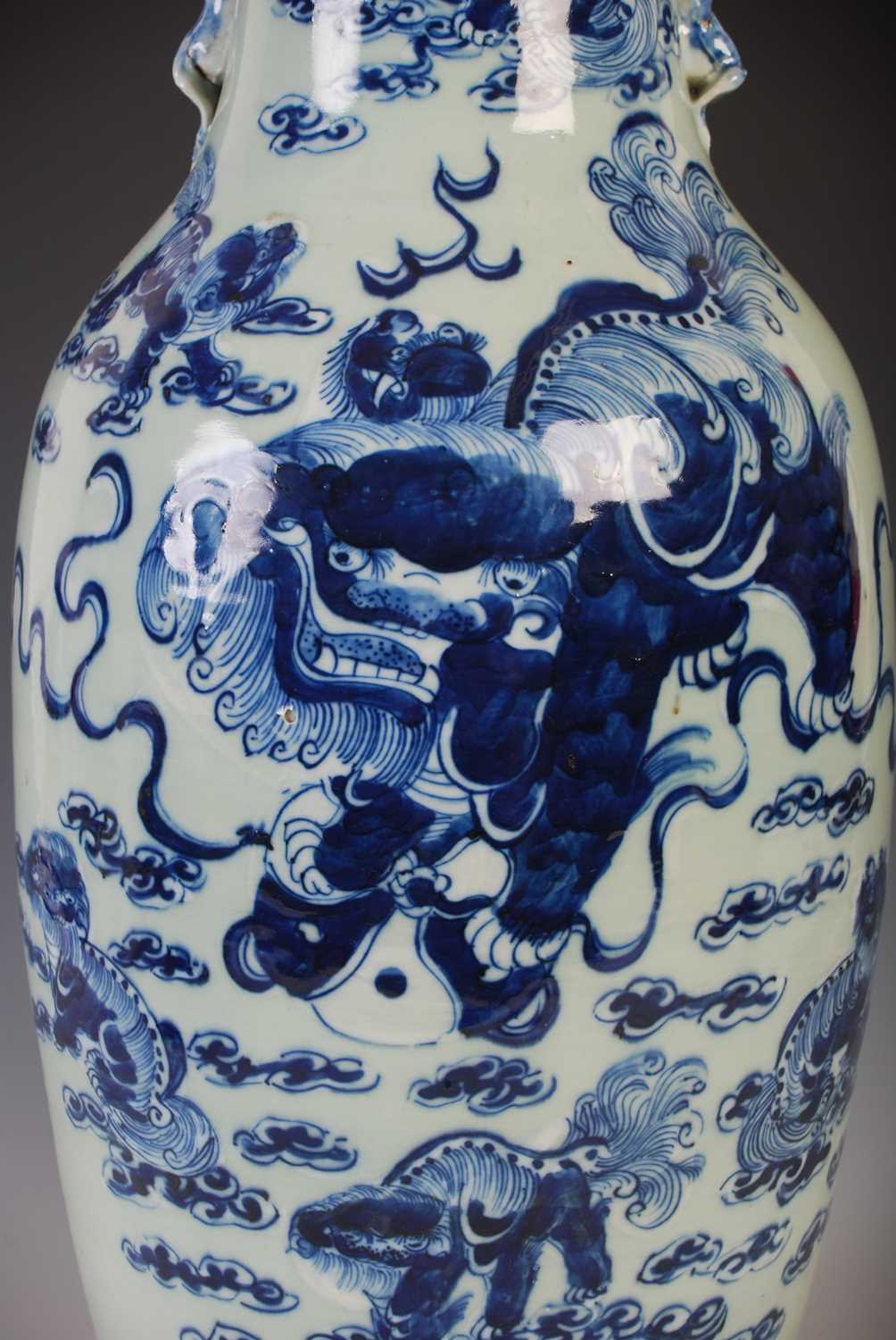 A large Chinese porcelain celadon ground vase, Qing Dynasty, decorated with shishi and five cubs, - Image 3 of 8