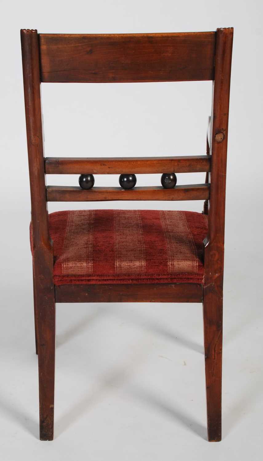 An early 19th century walnut and brass inlaid childs elbow chair, the rectangular top rail with - Image 6 of 6