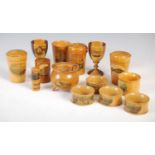 A collection of Mauchline Ware, to include four napkin rings, two decorated with 'Glasgow Green' and