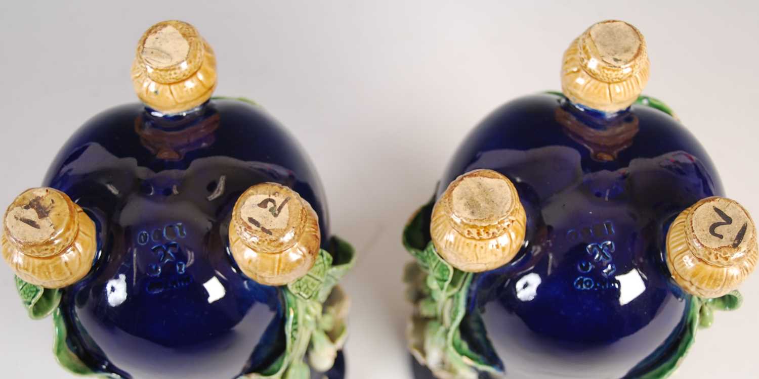 A pair of Minton Majolica pottery vases, dated 1866, decorated in relief with three white petalled - Image 6 of 8