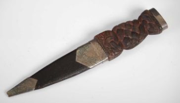 An Edwardian silver mounted sgian-dubh, Edinburgh, 1907, makers mark rubbed, the wooden handle