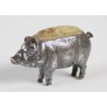 An Edwardian silver pin cushion modelled as a pig, Birmingham 1909, makers mark for 'Adie &