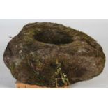A stone bird bath / planter, of triangular form with dished centre, approximately 65cm wide x 26cm