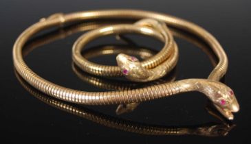 A 9ct gold articulated serpent necklace and matching bracelet, with synthetic ruby inlaid eyes,
