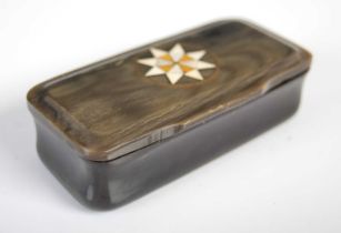 A horn oblong snuff box with incurved sides and integral hinged cover inlaid with a treen and bone