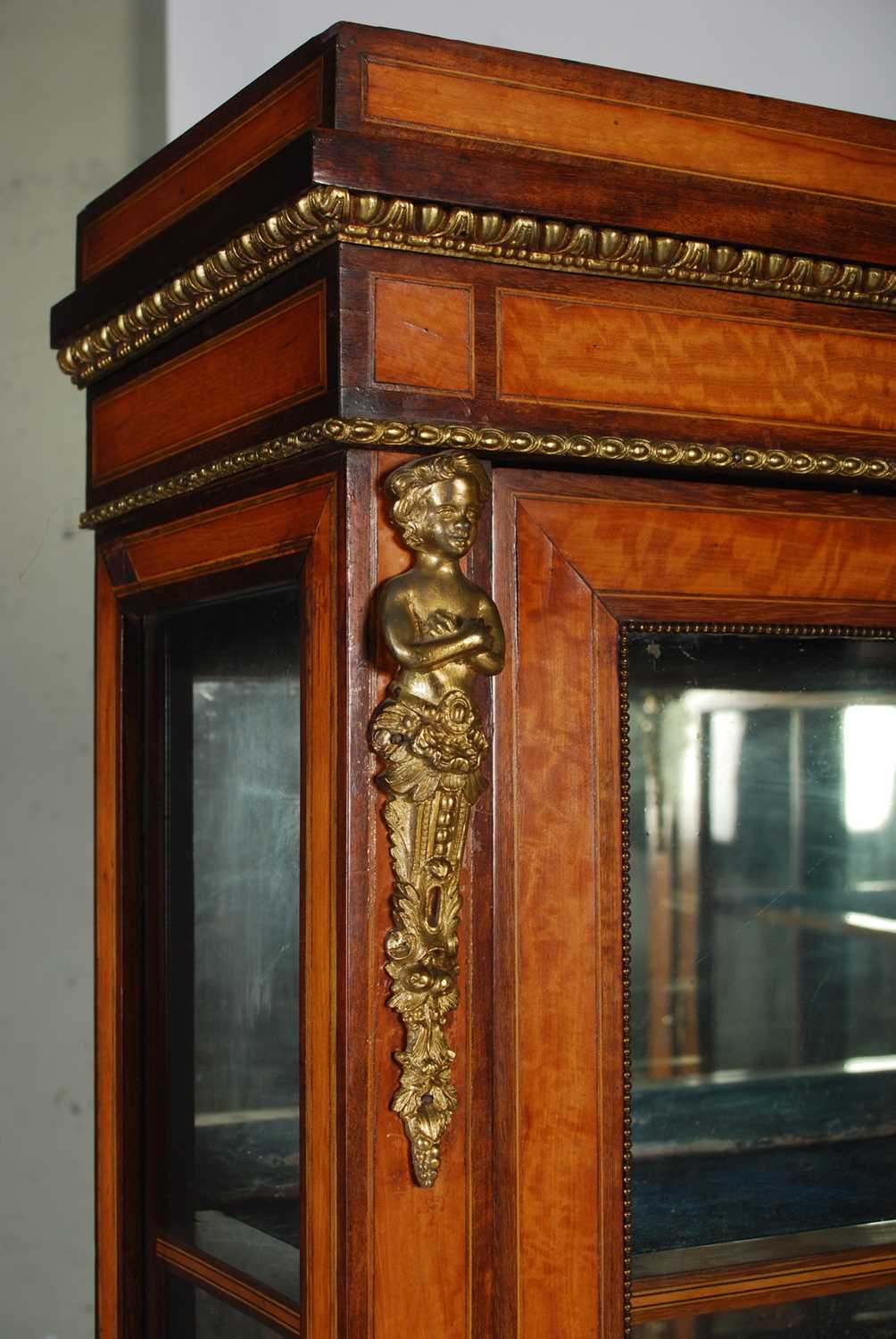 A pair of late 19th century satinwood, porcelain and gilt metal mounted display cabinets, the - Image 2 of 8