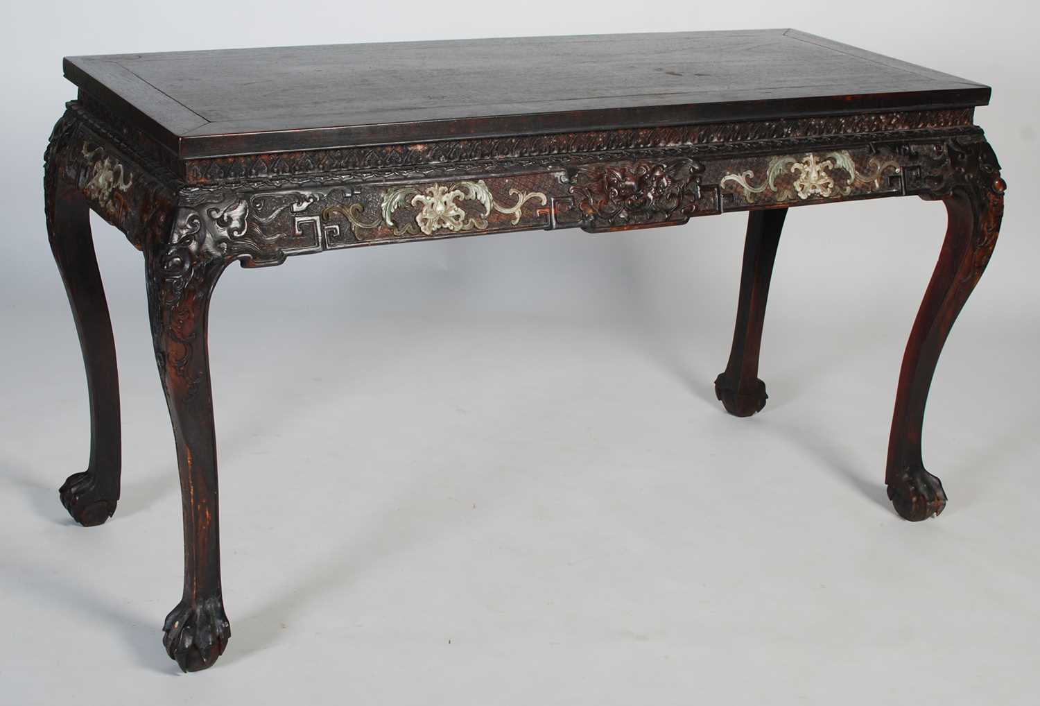 A Chinese dark wood and hardstone decorated scroll table, late 19th/ early 20th century, the