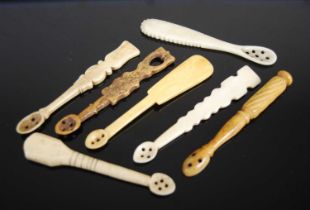 A group of seven Scottish carved bone snuff spoons of various shapes and sizes, one with pierced