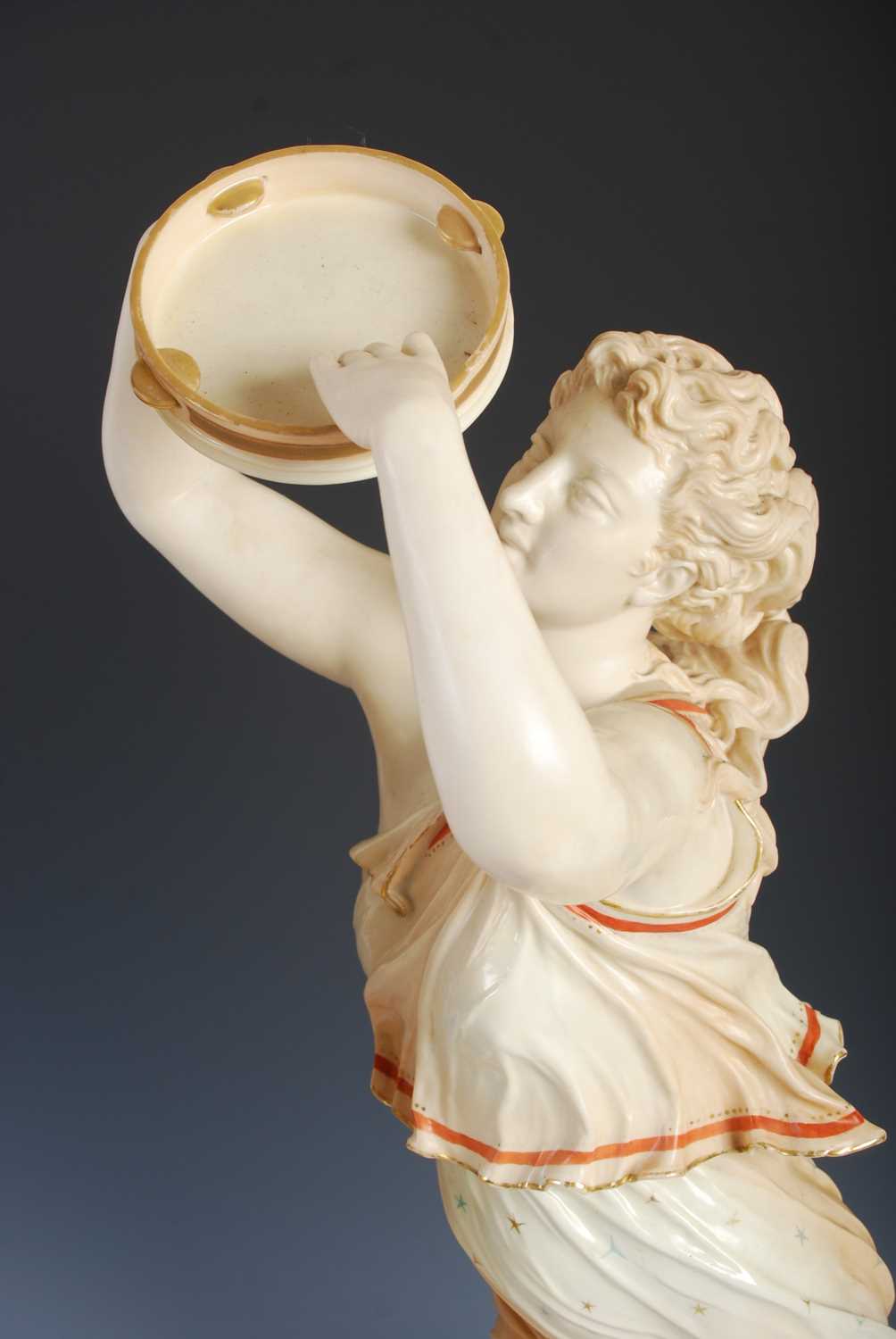 A large pair of Royal Worcester female tambourine players, modelled by James Hadley, with red, green - Image 3 of 8