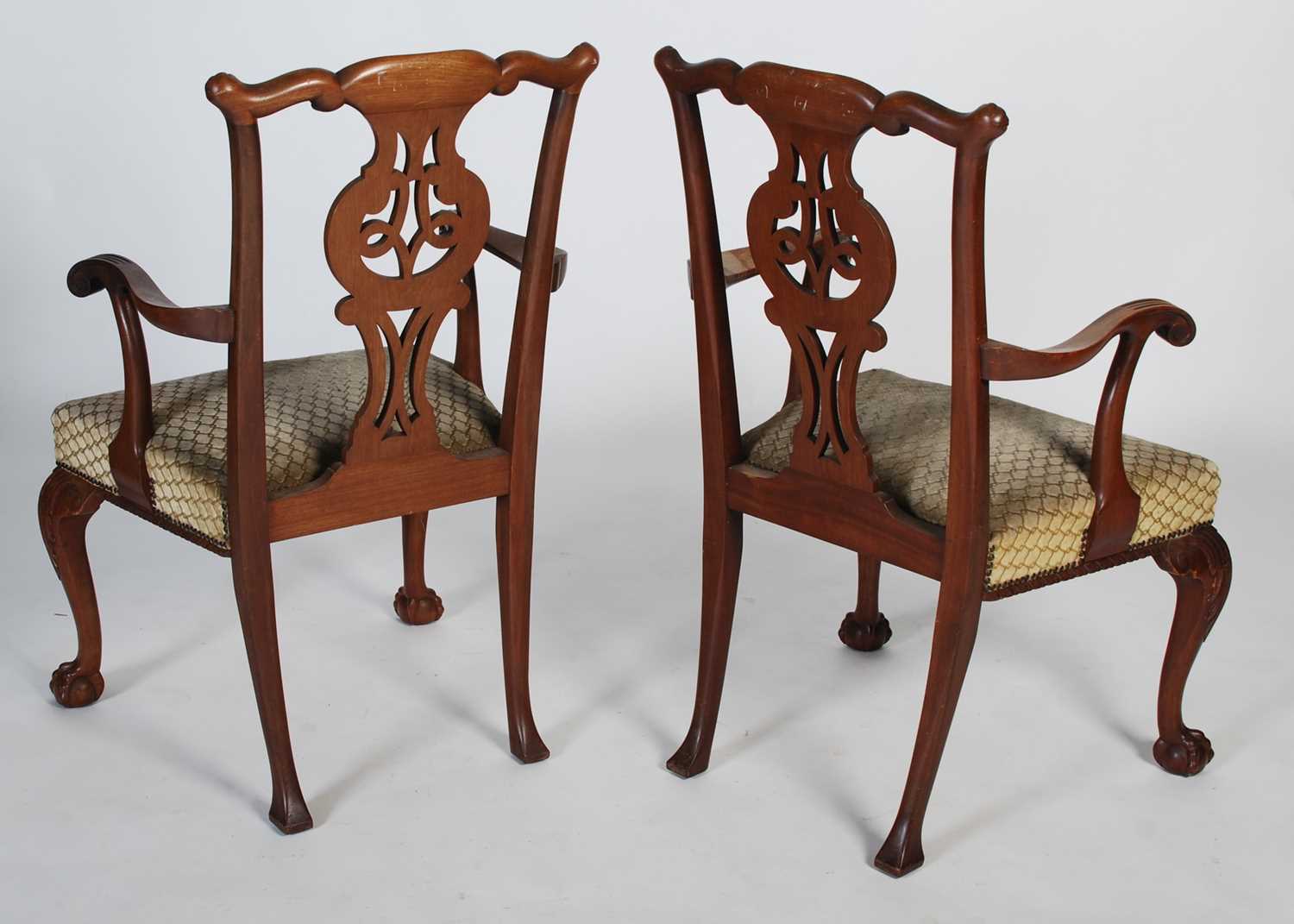 A pair of George III style mahogany elbow chairs, 20th century, the flower and scroll carved top - Image 6 of 6