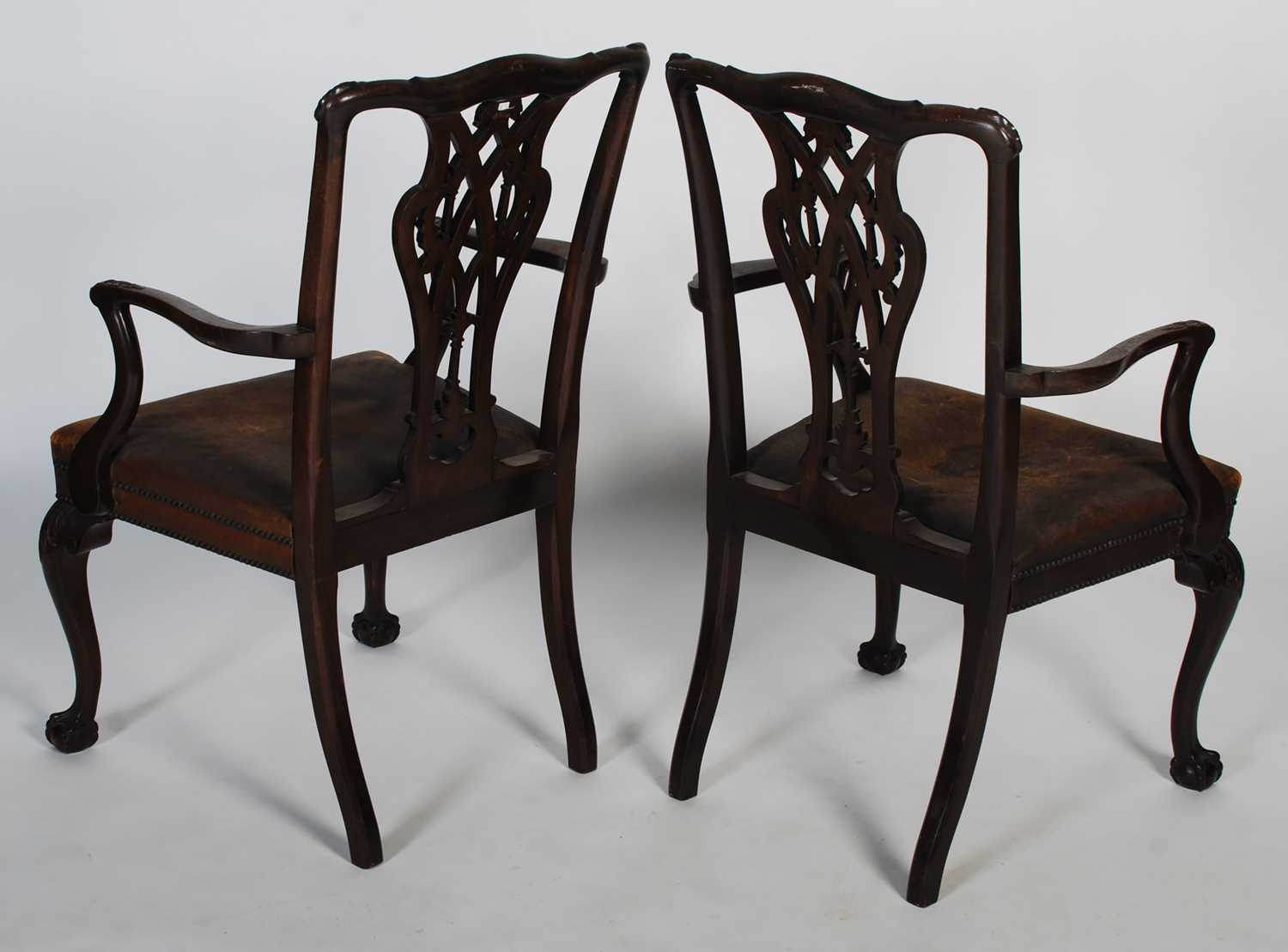 A pair of early 20th century George III style elbow chairs, the shaped top rail above a carved and - Image 7 of 7