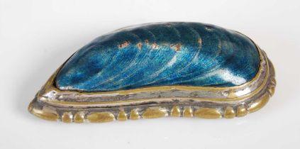 An unusual snuff box formed as a mussel shell, highlighted in teal enamel on copper with silvered-