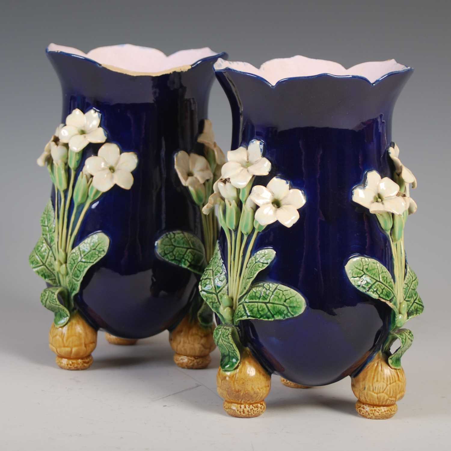 A pair of Minton Majolica pottery vases, dated 1866, decorated in relief with three white petalled - Image 2 of 8