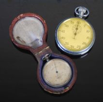 A white metal cased compensated pocket barometer, R & P Beck, London & Philadelphia, No.1104, case