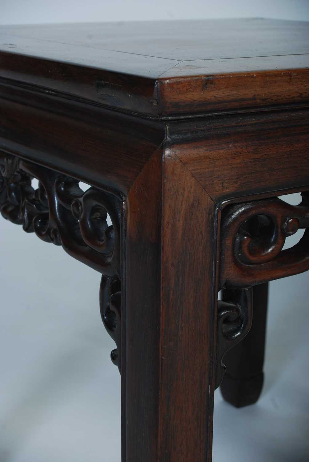 A pair of Chinese dark wood square occasional tables, late Qing Dynasty, the square panelled tops - Image 3 of 6