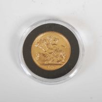 An Elizabeth II gold sovereign, dated 1980.