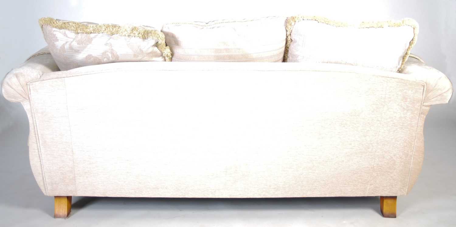 A modern Victorian style two-seat sofa, with loose cushion back and seat, raised on tapered turned - Image 5 of 5