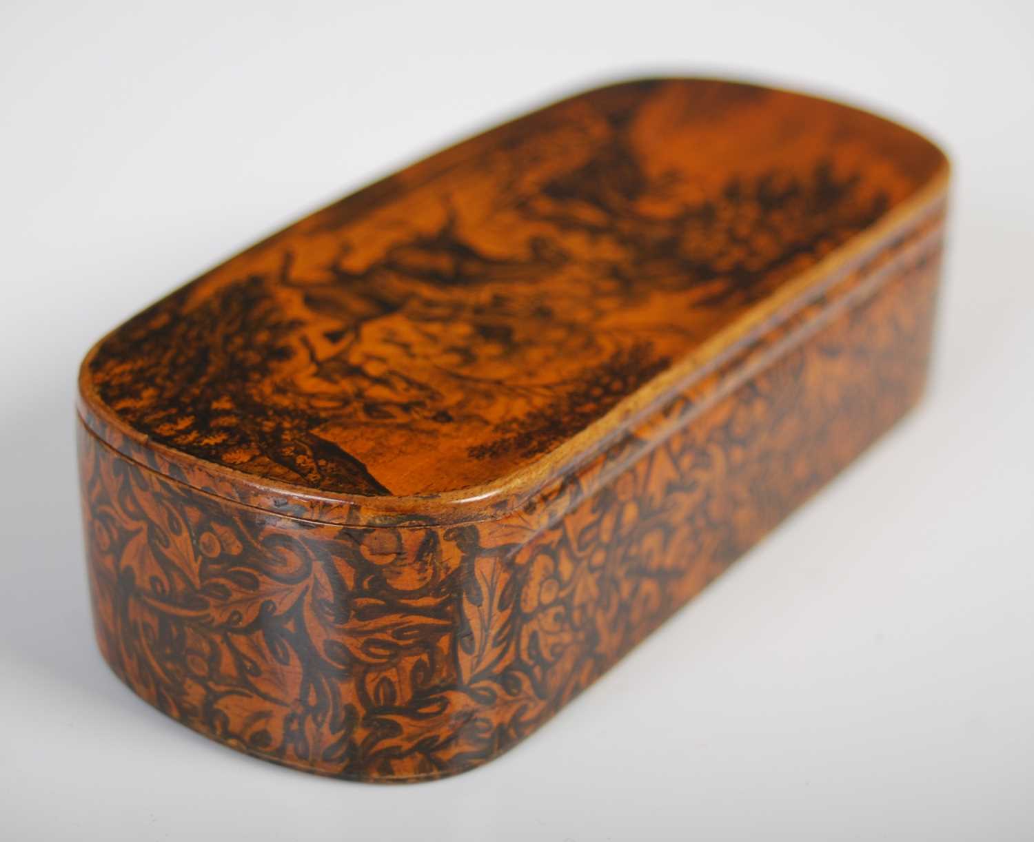 A Mauchline ware penwork rounded oblong snuff box with integral wooden hinge, finely decorated - Image 2 of 4