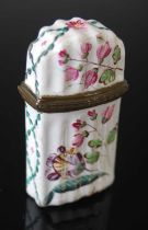 An 18th century Battersea enamel scent bottle case, the fluted body decorated with flowers and